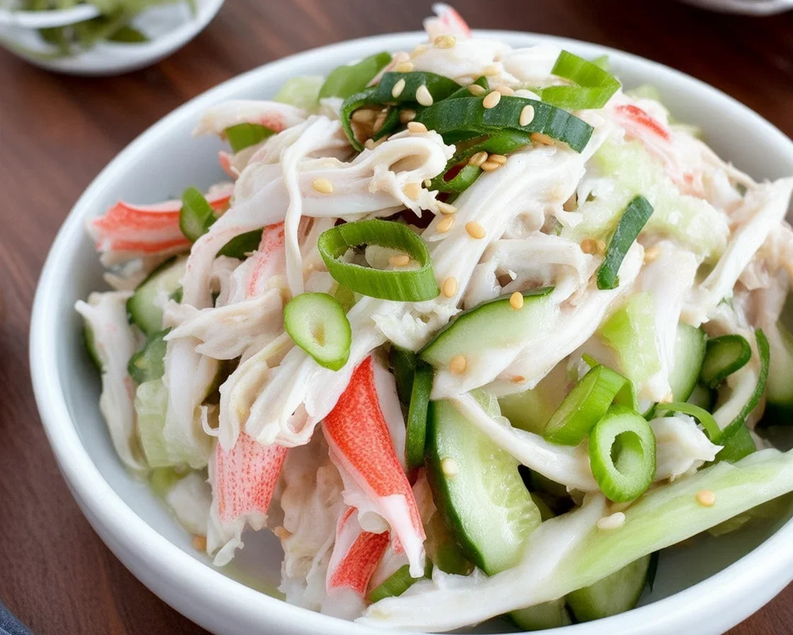 Vibrant cucumber crab salad with imitation crab, cucumber slices, and a creamy dressing.