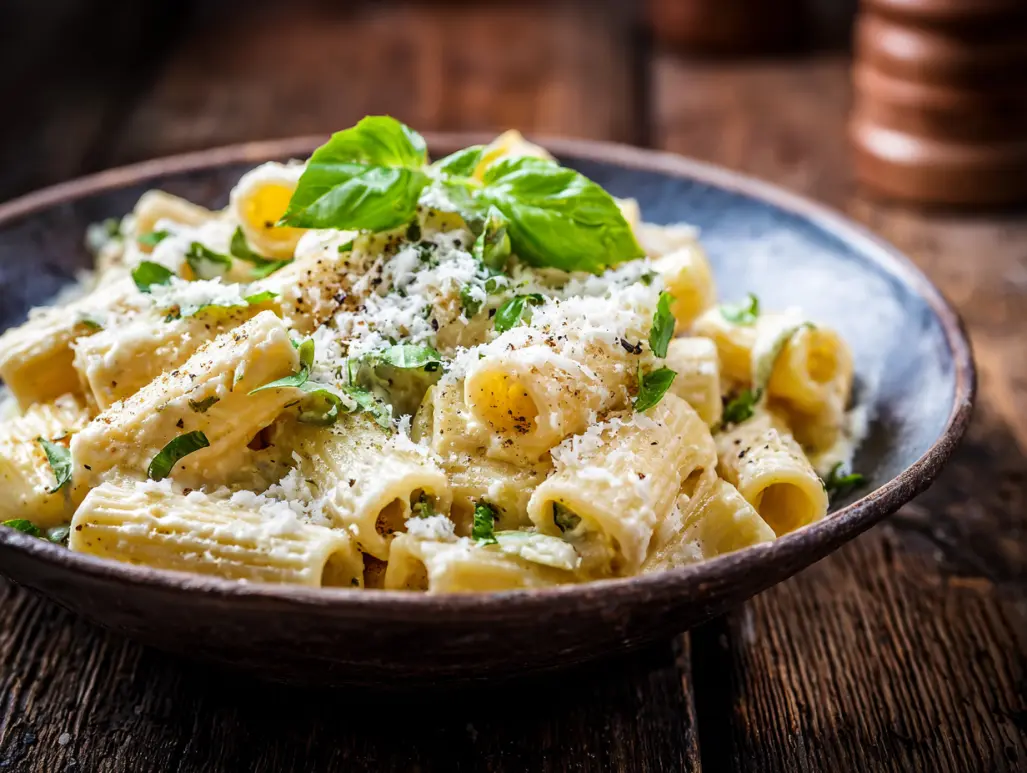 Ricotta & lemon mezzi rigatoni pasta in bowl