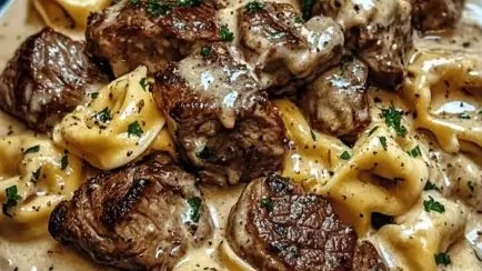 Cracked Garlic Steak Tortellini served in a creamy sauce with herbs